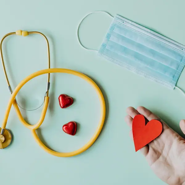Stethoscope, face mask and red hearts